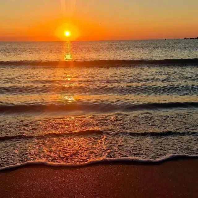 Sunrise over the sea on the beach at Mamaia Nord